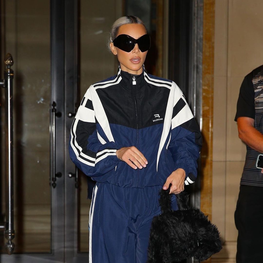 Kim Kardashian’s sporty tracksuit is borrowed from the boys