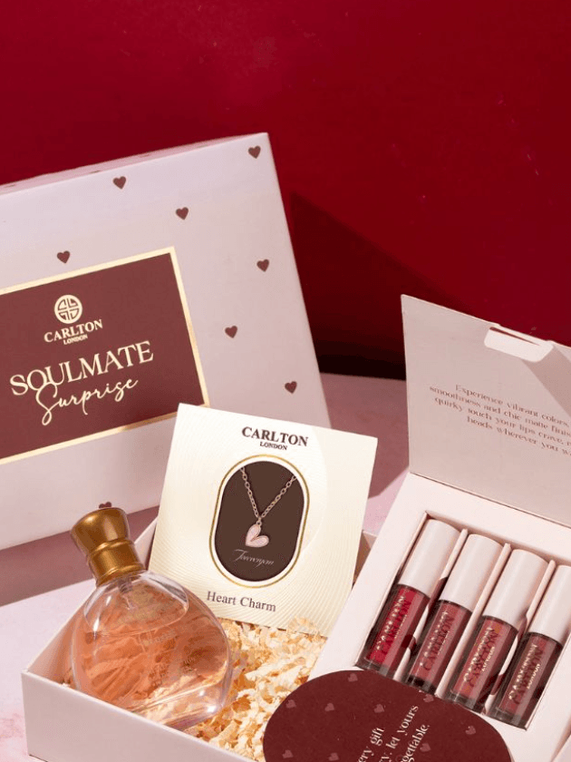 Image may contain Cosmetics Lipstick Bottle Perfume Accessories Jewelry and Necklace